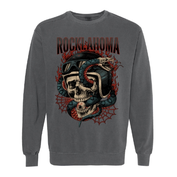Charcoal gray crewneck sweatshirt with a graphic of a skull in a biker helmet and goggles, wrapped in a red and green snake, surrounded by flames and spiderwebs. “Rocklahoma” text in red above.