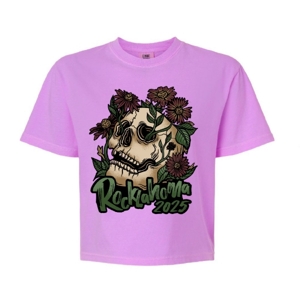 Front view of pink crop tee featuring a floral skull and "Rocklahoma 2025" graphic.